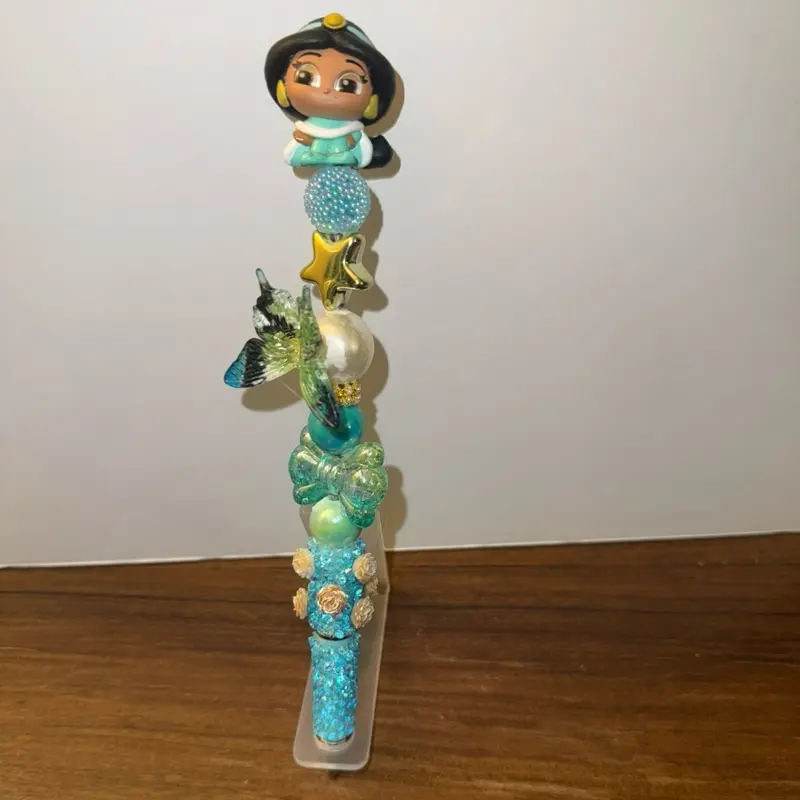 Cute Character in Blue Fancy Pen with Sparkling Accents and Adorable Design