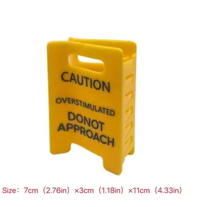 Funny employee accessories, a unique design featuring a yellow logo and black text, a safety warning sign for excessive stimulation, hair claw clip