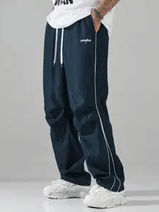Men’s Lightweight Navy Track Pants with Drawstring Waist, Offering All-Day Comfort for Casual Errands, Hangouts and Street Style Occasions.