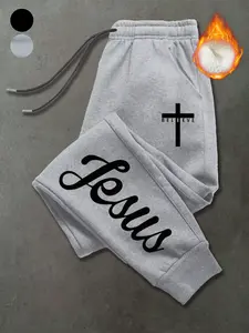Viral Jesus Graphic Warm Sweatpants: Heavyweight Fleece Lined Black Joggers with Cross Print. Essential Streetwear Bottoms for a Unique Faith-Based Look #JesusPrint #Streetwear