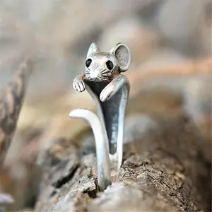 A cute mouse ring, adjustable in size, makes a lovely gift to wear with everyday wear or special party decor.