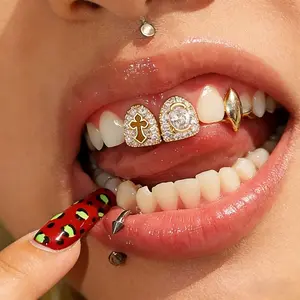 Double Grillz with hollow cross and oval zirconia, a street fashion accessory for men performing
