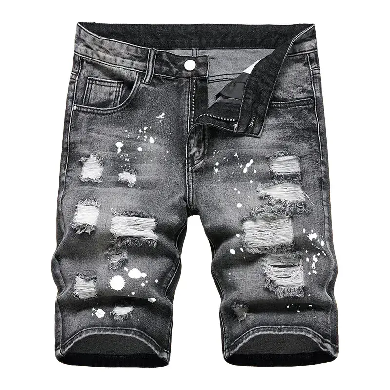 Men’s handmade ink-splatter denim shorts in black with a gradient wash and distressed finish, delivering a vintage worn look. Straight cut, knee length. Hip-hop street style casual summer wear, suitable for everyday wear and parties.