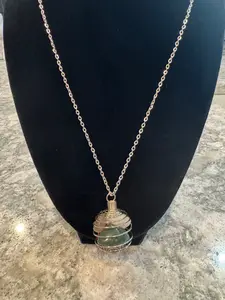 Silver Chain and Cage Holding white quartz, clear quartz, red jasper, and green jasper Gems Stones