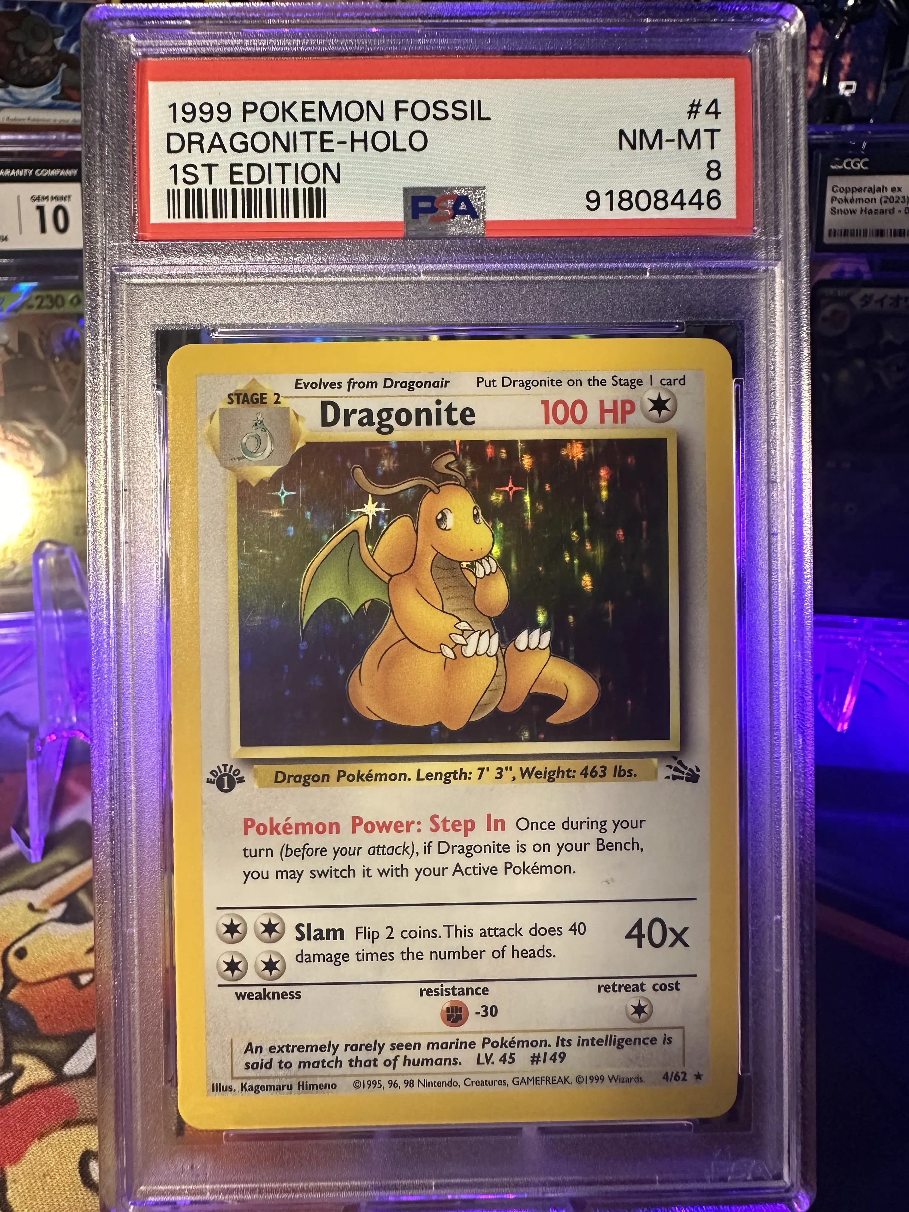 PSA 1999 POKEMON FOSSIL 4 DRAGONITE HOLO 1ST EDITION 8