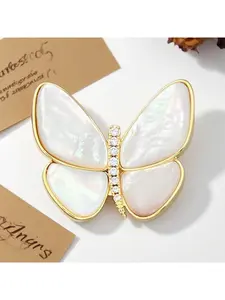 Light luxury and high - end natural mother - of - pearl butterfly magnetic brooch, delicately micro - set with zirconia and equipped with a strong magnetic clasp. It's a popular clothing accessory.