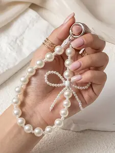 Elegant Pearl Bow Bag Charm & Phone Wristlet, Luxury Faux Pearl Handbag Pendant, Aesthetic Crystal Bow Keychain Accessory, Perfect Birthday Christmas Valentine's Day Gift for Women Girls, Trendy Bag Decor for Tote Backpack