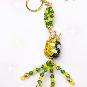 Orunla Key Chain Llavero Para Orunla with Green and Yellow Beads and Gold Crown Charm