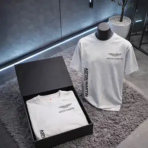 Collaborated Aston Martin streetwear F1 team commemorative T-shirt with front and back graphic prints; short-sleeve pure cotton, high-weight yet soft; unisex/couples matching; relaxed fit, oversized casual drop-shoulder design.