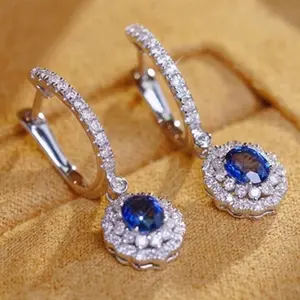 The new product features a full diamond earring set withhigh-quality blue zircon for elegant and fashionablewomen's earrings, suitable for daily wear or gatherings. ltis a delicate gift for women as a jewelry accessory