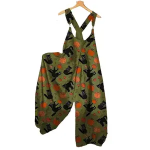 Women’s Halloween drop black cat and pumpkin print loose-fit jumpsuit/overalls in soft fabric—chic one-piece casual sleeveless round-neck snap-button detail women’s outfit suitable for fall parties and everyday looks