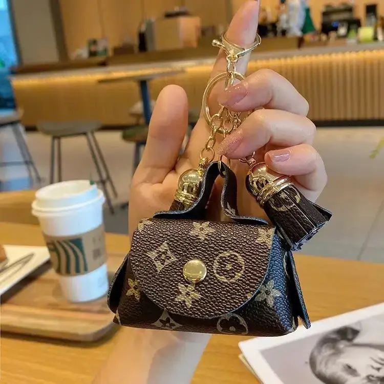 Bluetooth earphone pouch / keychain / bag charm / cute tassel design