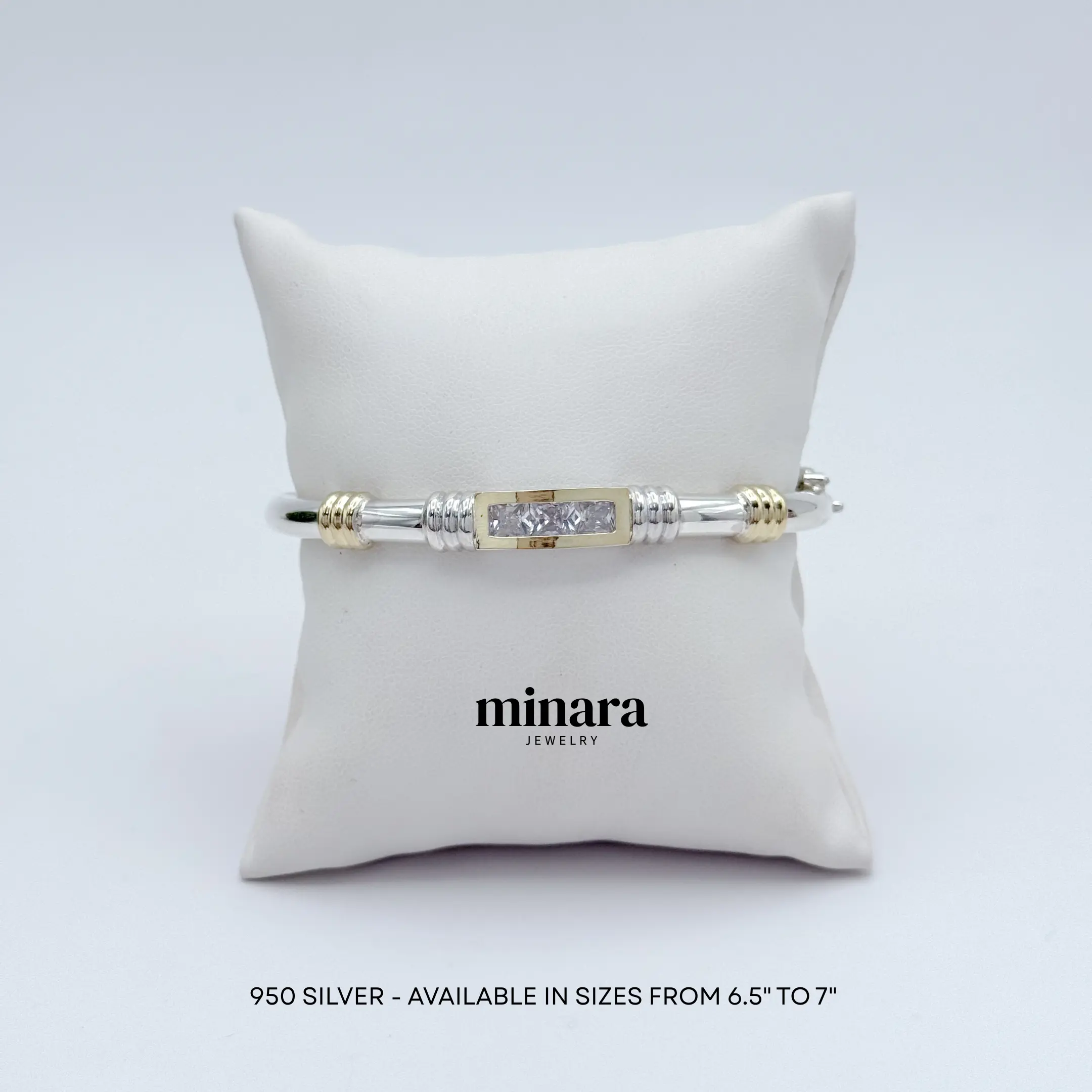 950 Silver  bracelet with rectangular zircon and yellow gold details.