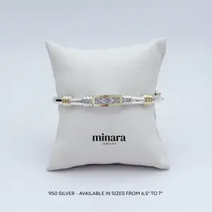 950 Silver  bracelet with rectangular zircon and yellow gold details.