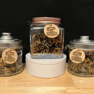 Give a F*** jar.  Fun gift.