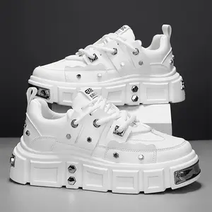 Edgy platform sneakers: punk-inspired metal studded |   street fashion statement |   unisex white platform shoes |   are perfect for skateboarding, partying and everyday wear Athletic Running