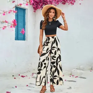 Women Two Piece Set Spring Loose Fit Boho Spaghetti Strap Floral Breathable Ribbed High Waist Wide Leg Stretch Soft Crop Top Flared Pants Straight Leg