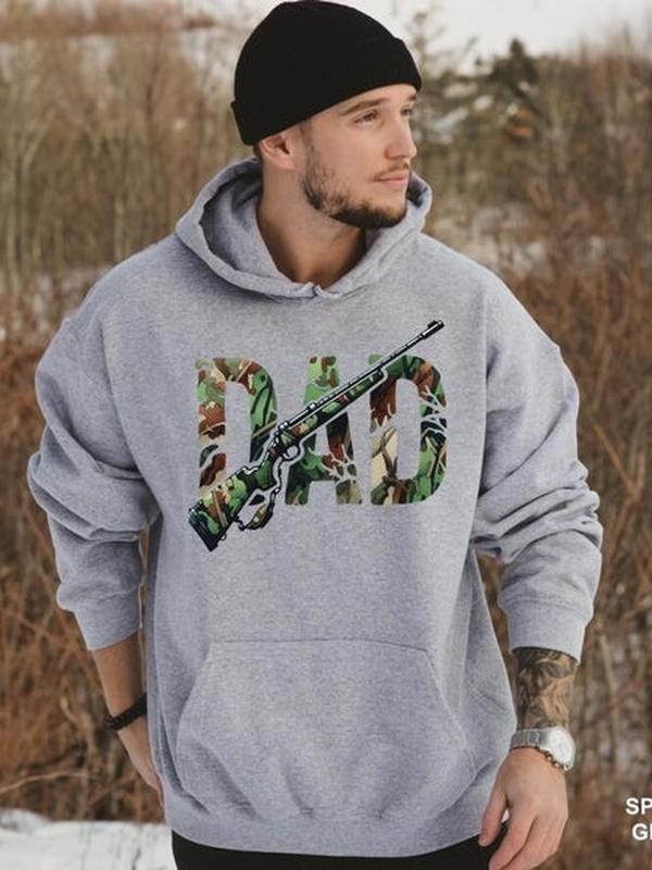 Camo Rifle Dad Hoodie and Sweatshirt crafted with 100% Cotton, casual hunter-inspired pullover for men and women, rugged outdoor style, perfect gift for dads who love hunting