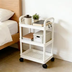 Portable storage trolley with a multi-layer design and rolling base, ideal for daily household storage in bedrooms, living rooms and studies as well as office organization. It is lightweight and easy to move around. Multilayer Shelf Display Storage Rack