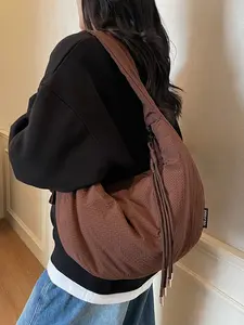 High end, niche, simple grid shoulder bag, dumpling bag, light and comfortable, versatile crossbody bag, casual, simple outdoor sports, work and commuting
