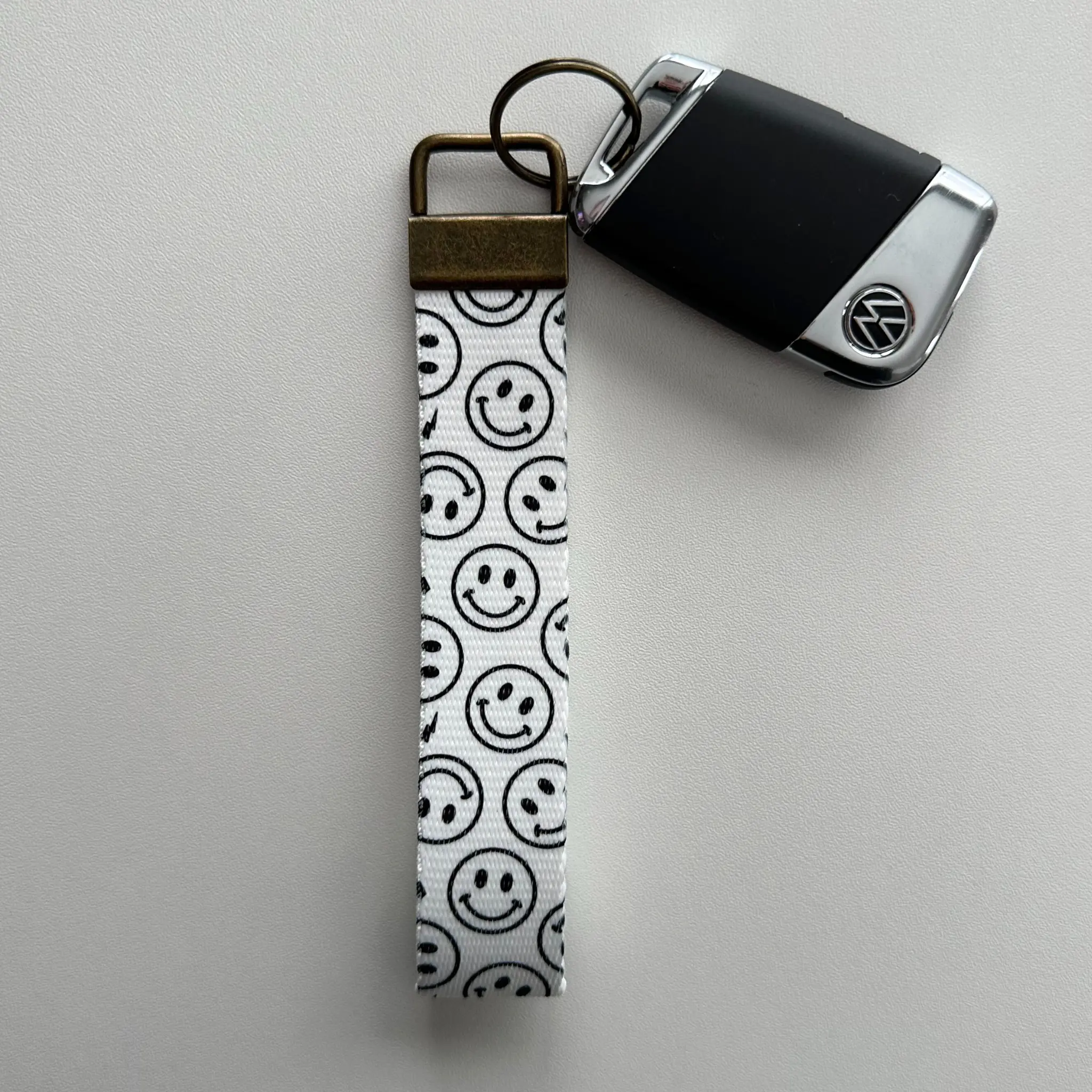 Black Smileys Key Fob Wristlet | Antique Brass Hardware