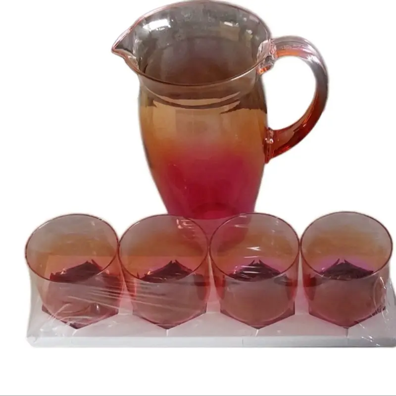 Reusable Plastic Pitcher and 1 pack of four cups Pink and clear Drinkware Beverage Set