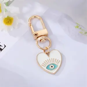 Rainbow Heart-Shaped Evil Eye Keychain / Perfect Gift for Friends Or Partners / Blue Eye to Hang on Bags, Car Keys, Or Headphone Cases / Key Accessory