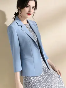 A solid light blue blazer for women, featuring an elegant commuter style, suitable for daily work commutes, light business meetings, and similar occasions.