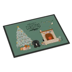 Carolines Treasures  24 x 36 in. Black Pekingese Christmas Everyone Indoor or Outdoor Mat