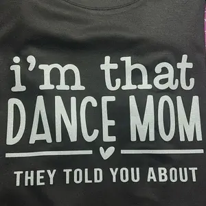 I’m that Dance Mom they told you about. Bella Relaxed crew soft tee. Black tee. White Glitter Ink.
