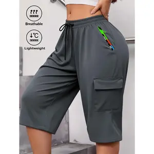 Women's summer cropped cargo pants (7/8 length) in gradient green, featuring zippered pockets, stylish large patch pockets, and an elastic drawstring waist. These casual athletic pants are perfect for outdoor activities and everyday wear.