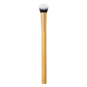 concealer paw brush - angled for seamless application