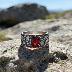 Vintage carved oval-cut red synthetic zircon ring, with hand-carved-inspired thistle relief surrounding the band, a Celtic ethnic style ring, an androgynous Gothic wide-face ring, a gift for her.