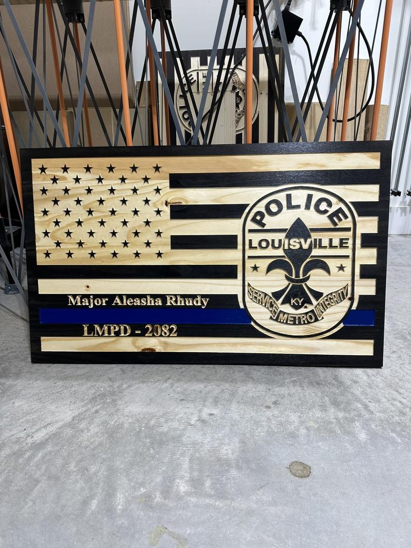 Custom engraved wooden American flags for police, firefighters, veterans or active duty military make great decor and hangable.