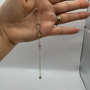 Manilla de infinito con ojo en oro 14K talla 7”