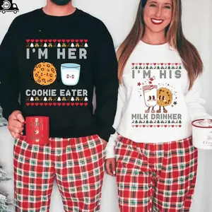 Matching Christmas pajamas for couples featuring “I’m Her Cookie Eater” & “I’m His Milk Drinker” — cute, funny holiday PJs set and a perfect couple gift.