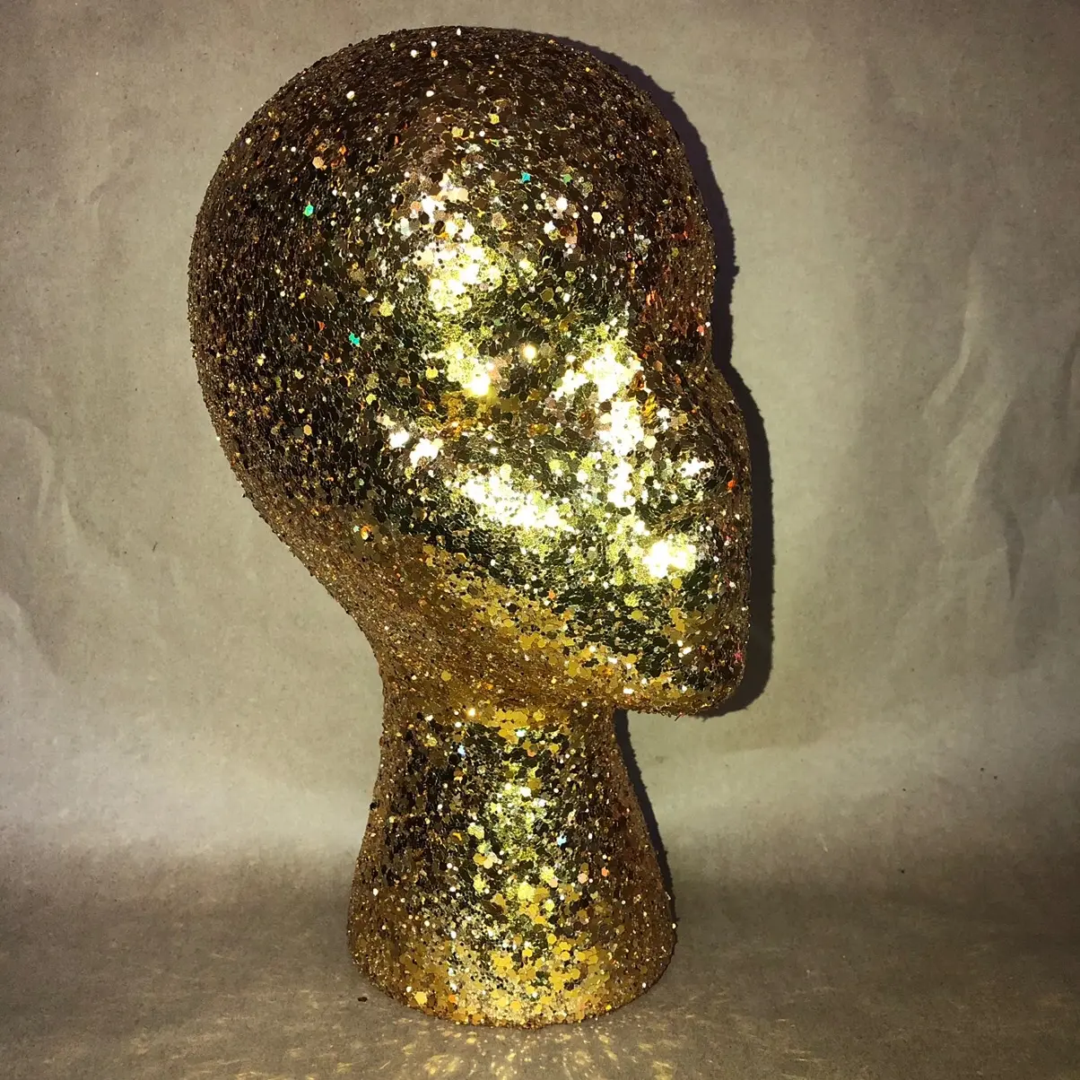 Sparkling and functional wig display and storage heads.