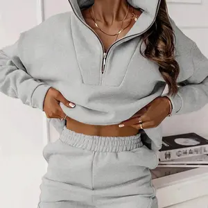 Two-piecewomen'ssolid-colorcrew-neckpulloverwithlongsleevesandelasticwaistandloose-fittingbottompants,perfectforalloccasionsandversatileinstyle.