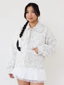 Blue Away Jacket - White Quilted with Light Blue Floral Print Peter Pan Ruffle Collar Long Sleeves Tie Front Closure Fully Lined Front Patch Pockets