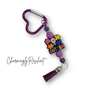 CharmingResilient Autism Awareness Bag Charm with Purple Beads and Tassel for Support and Awareness