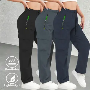 3-pack women’s athletic casual cargo pants with zippered pockets; these pants feature stylish large pockets and an elastic waistband with adjustable drawstring; slim-fit long pants suitable for casual wear.