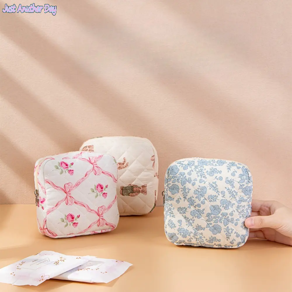Floral Sanitary Pad Storage Pouch — Large Capacity, Portable, Cute Design — Versatile Bag for Sanitary Pads, Cosmetics, or Data Cables Floral Sanitary Pad Storage Pouch — Large Capacity, Portable, Cute Design — Versatile Bag for Sanitary Pads, Cosmetics, or Data Cables