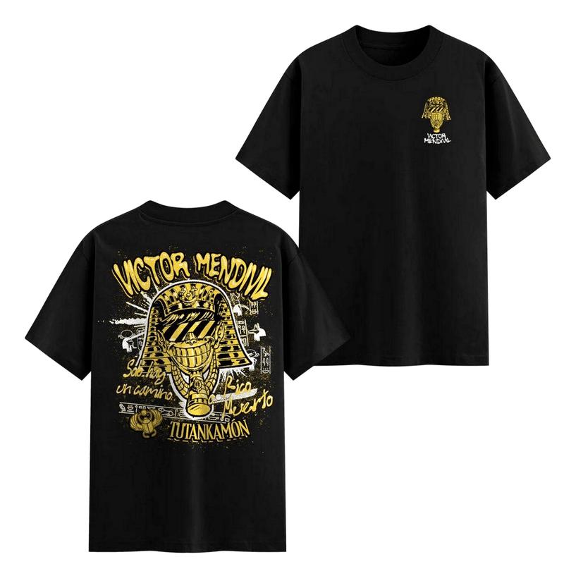 Rico o Muerto Victor Mendivil Graphic T-Shirt – Egyptian Pharaoh Design with Bold Yellow Text Premium Cotton Fabric Un P Unisex Basic Cotton Tee