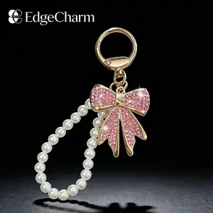 Rhinestone Bow Keychain with Pearl Wrist Strap, Luxury Bling Bow Car Key Ring, Elegant Metal Bag Charm Accessory for Women
