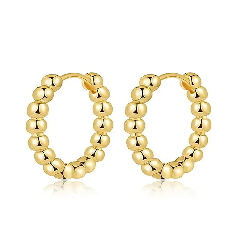 A pair of golden bead earrings