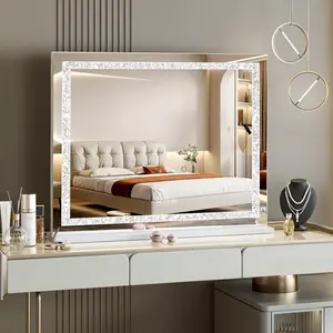 Hollywood-style LED makeup mirror with crystal light strip, smart touch control, 3-color dimmable light strip and adjustable brightness, USB charging, and 10x magnification. This tempered high-definition mirror is suitable for tabletop or wall mounting.