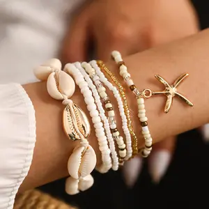 7 Pcs Bohemian Pearl Bracelets Set with Seashells Starfish Pendants Women Stackable Adjustable Hand Jewelry Random Pearl Colors Daily Wear Gifts