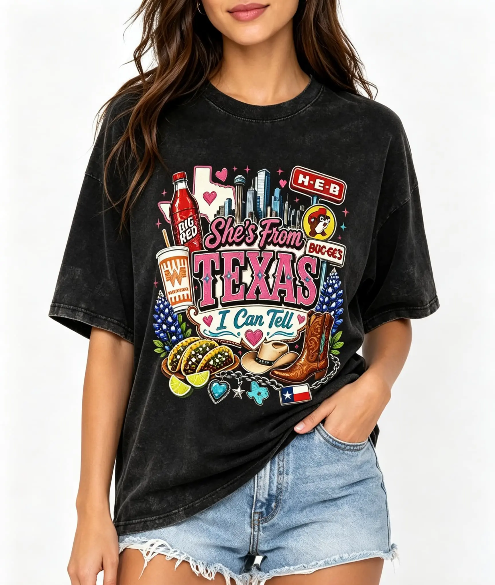 Vintage acid wash blue “She’s from Texas—I can tell” local landmark print T-shirt featuring Buc-ee’s, HEB, and Whataburger; 100% cotton, soft, breathable, sweat-wicking, drop-shoulder crew neck tee; unisex retro Southern top for Texas travel, daily gather