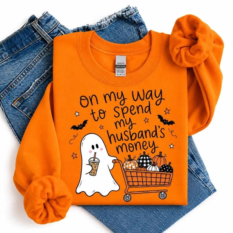 On My Way To Spend My Husband’s Money Tee, Sweatshirt and Hoodie, Retro Ghost Shopping Shirt, Funny Halloween Shopping, Pumpkins In cart