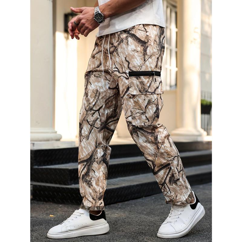 Men's camouflage print zippered pocket trousers, slim-fit athletic pants, durable trousers for autumn, men's wear-resistant outdoor training pants, streetwear fashion, vacation wear, men's clothing